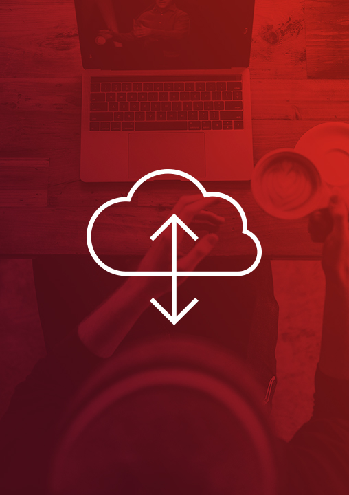 An icon of a cloud and a vertical, double-headed arrow. The icon is set against a red-tinged background featuring a person holding a cup of coffee and sitting at a table with a laptop in front of them.