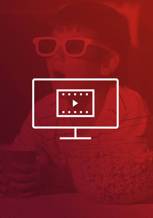 An icon of a screen displaying a video player. The icon is set against a red-tinged background featuring a young boy wearing 3D glasses with a bowl of popcorn next to him.