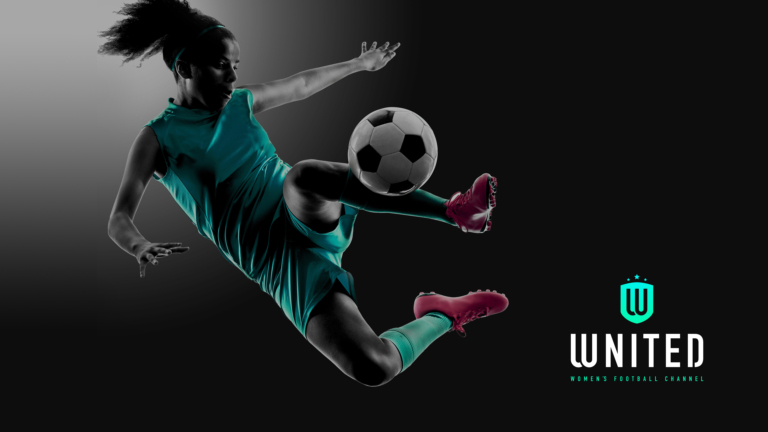 A female footballer about to strike a volley. Wnited. Women's Football Channel.