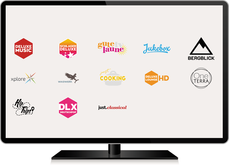 A screen with music TV channel logos displayed on it.