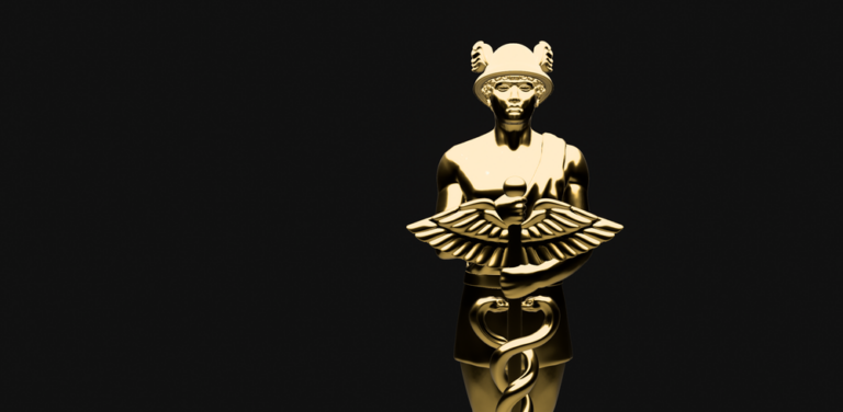 A gold-coloured Hermes figurine against a black background.