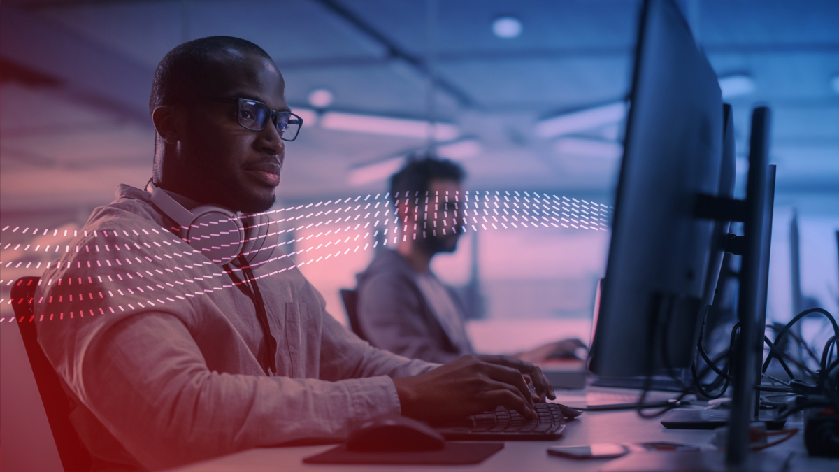 A man working at a computer.