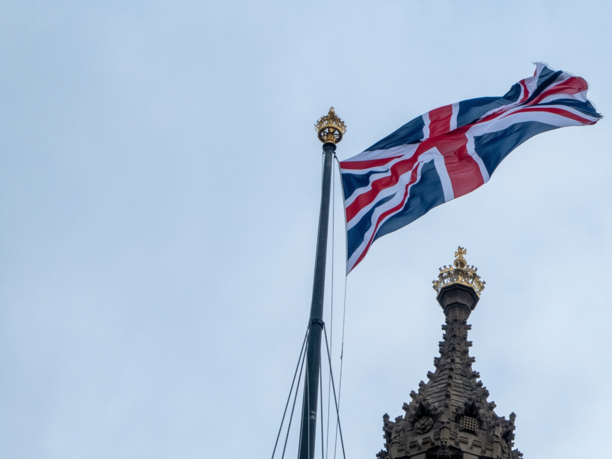 A Union Flag fluttering in the wind.