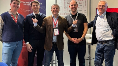 Five men at a conference